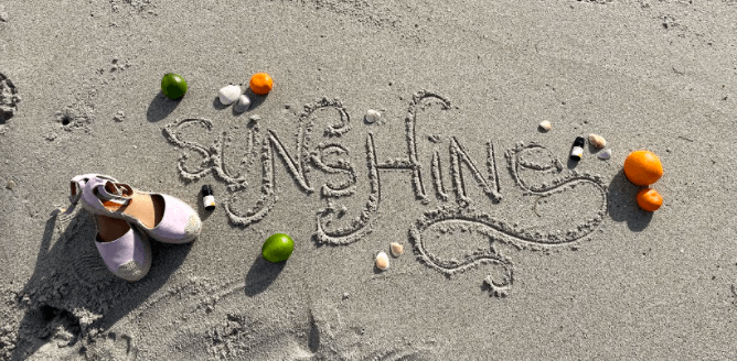 Sunshine drawn in the sand