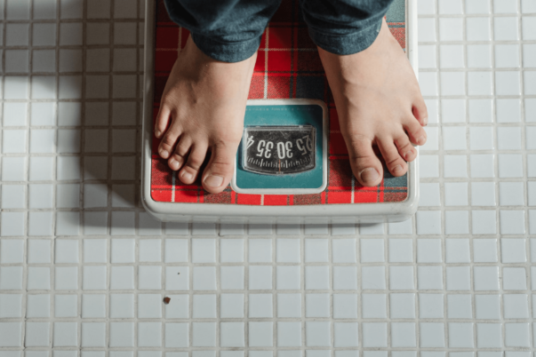 Person on weight scale
